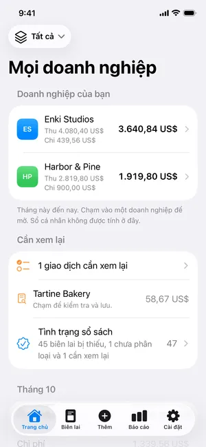 Màn hình chính: lợi nhuận tháng này của hai doanh nghiệp, một biên lai cần xem lại và tình trạng sổ sách